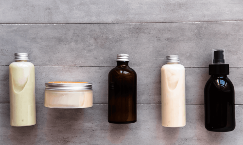 Jars and bottles of clean beauty products.